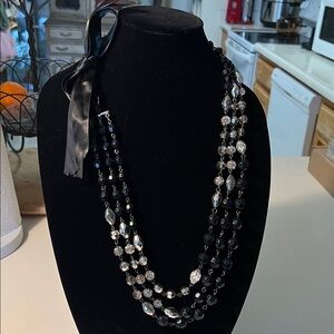 Elegant Three-Strand Black and Silver Beaded Necklace with Satin Tie